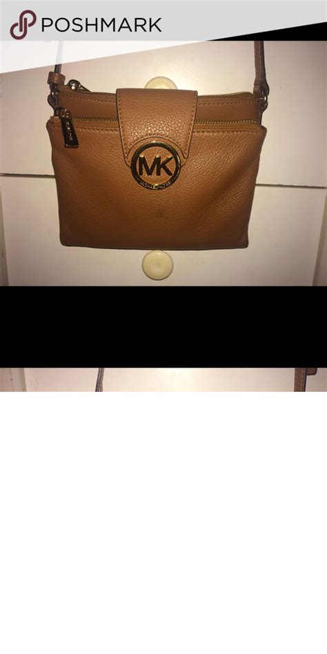 used michael kors crossbody purse.